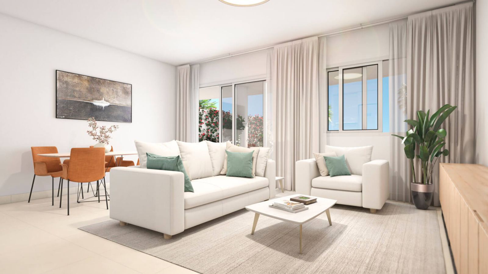 Lichte, moderne appartement interieur met witte meubels en groene accenten.